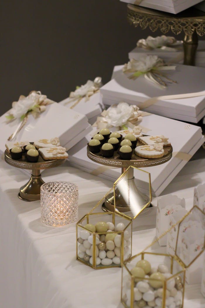 Mastering the First Impression: Your intriguing post title goes here Beautifully arranged dessert table featuring chocolates and elegant decorations for special occasions.