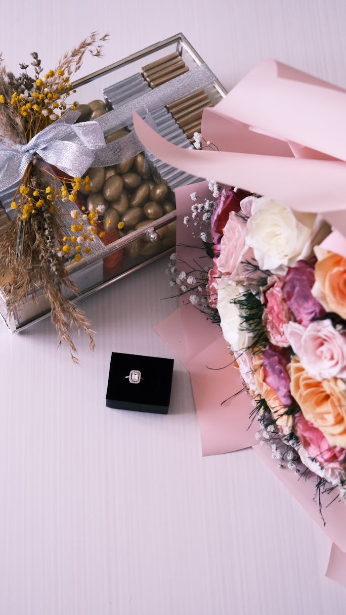 A luxurious bouquet and gift box with chocolates, perfect for celebrations and romance.